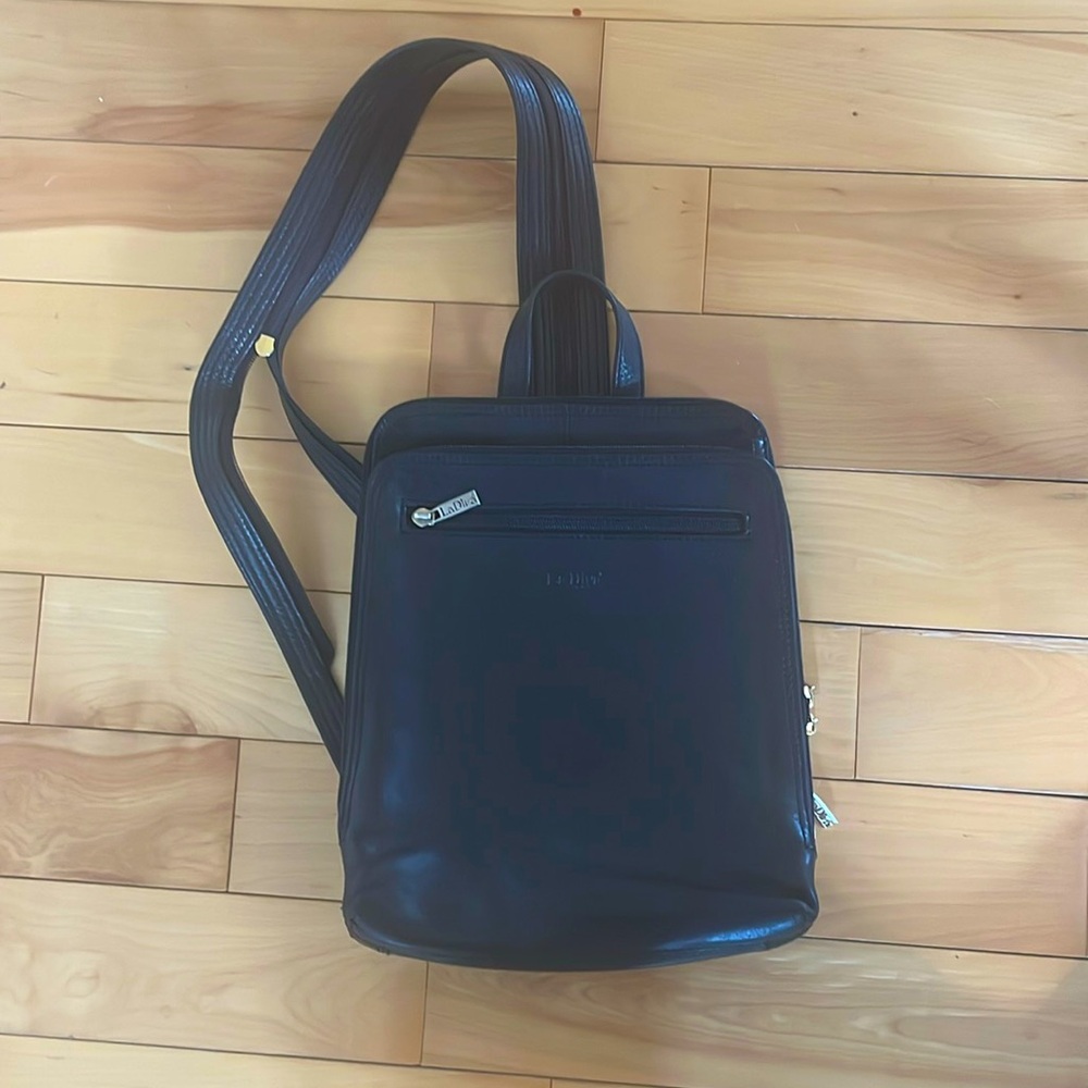 La Diva Black leather back pack purse/ shoulder bag.